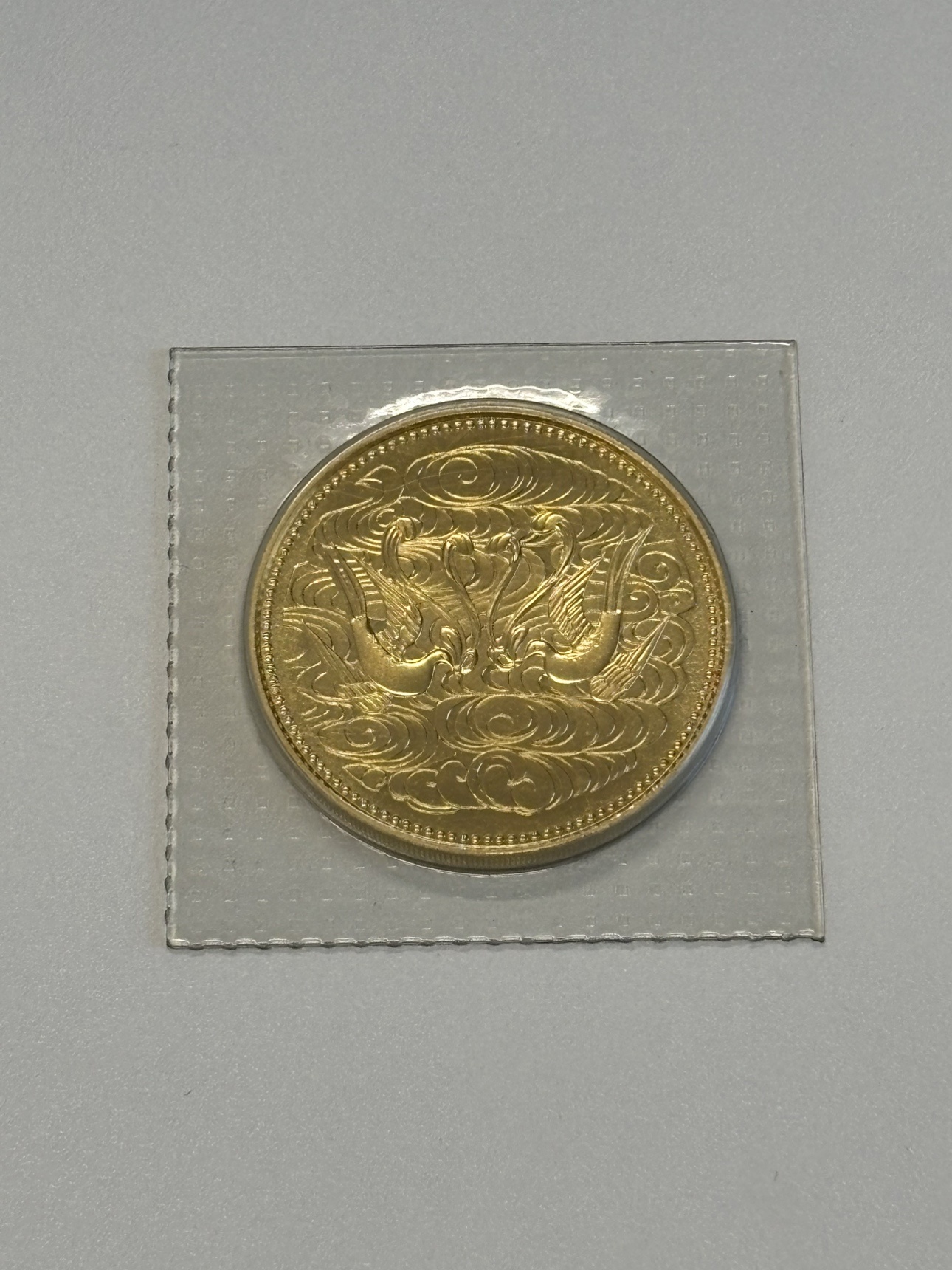 天皇陛下御在位60年記念10万円金貨
