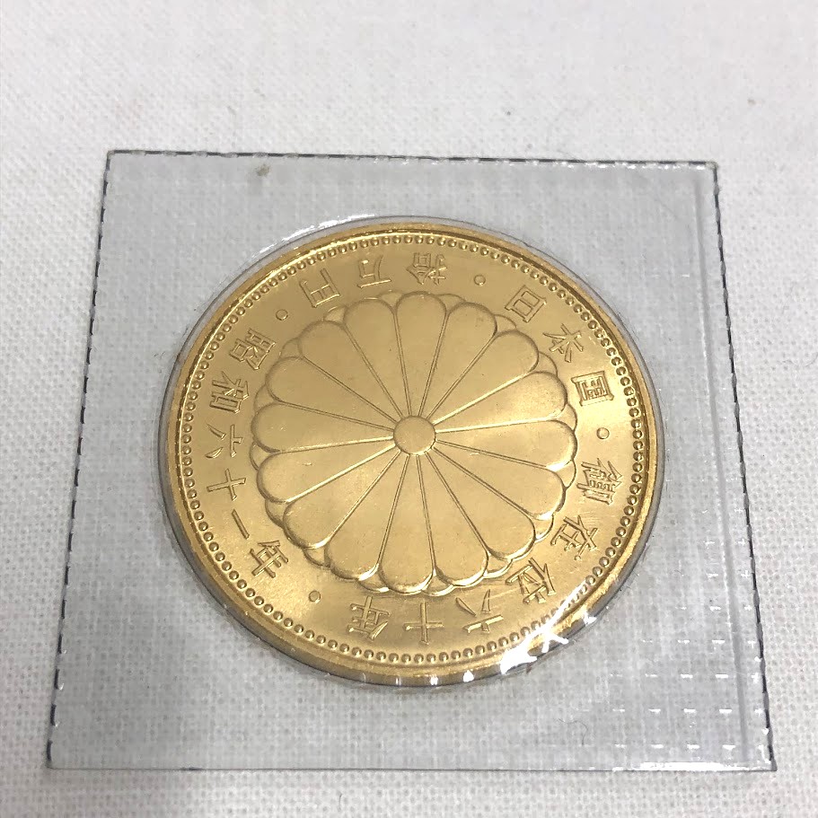 天皇陛下御在位60年記念 10万円金貨